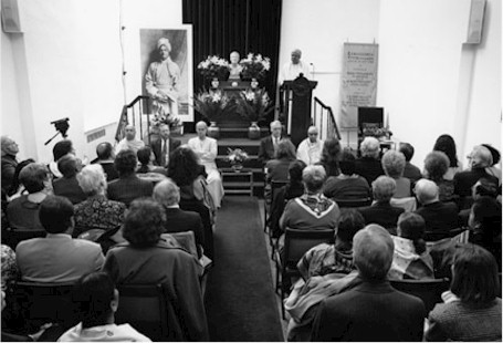 Swami Adiswarananda addressing the congregation, view from crowd.